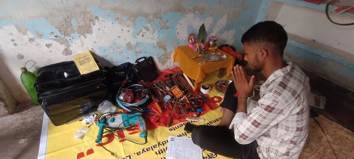 Traditional puja ceremony with tools before starting a new electrical project in Lucknow by Prajapati Electrical