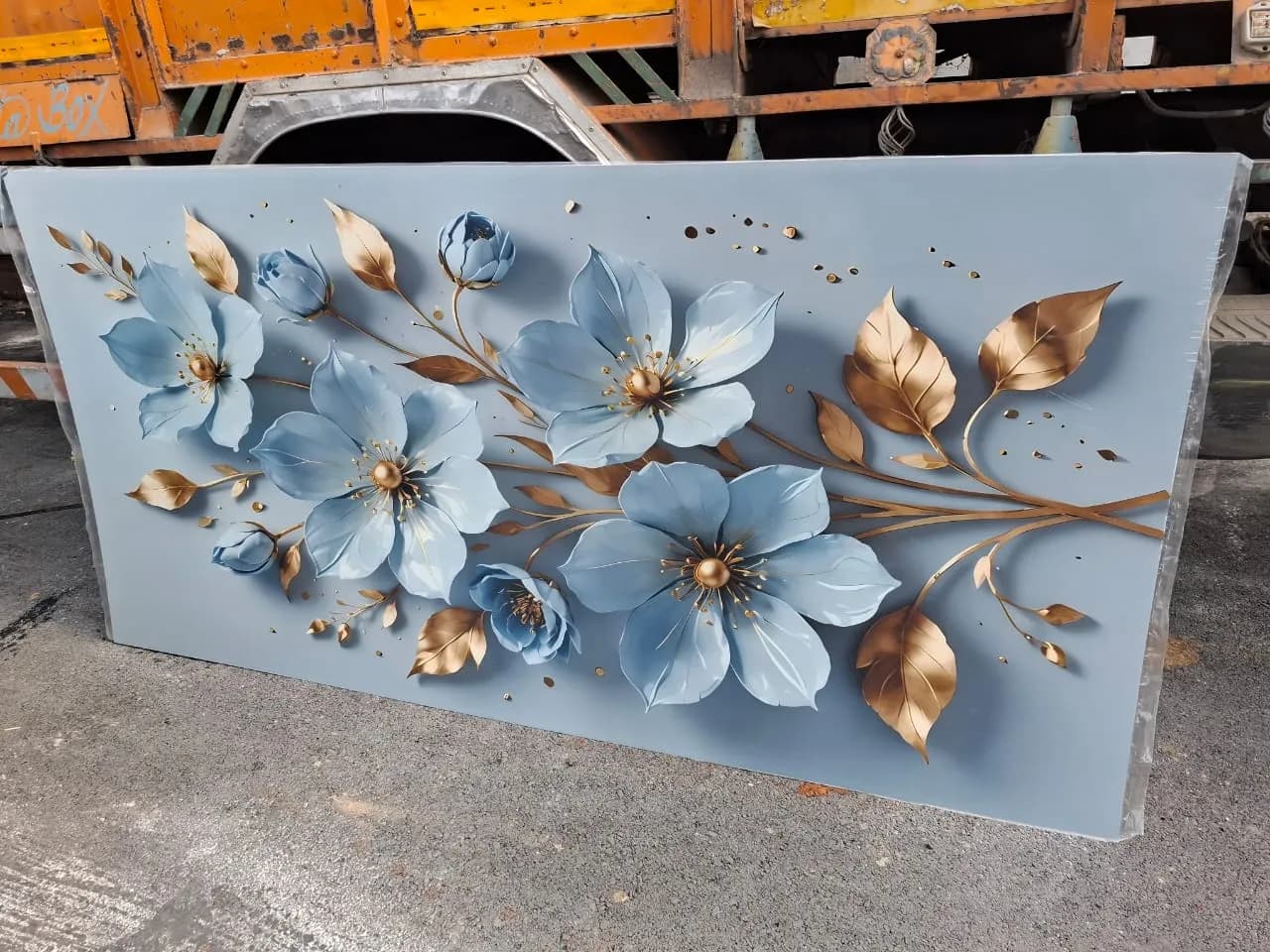 Premium blue and gold 3D floral PVC wall panel ready for installation at customer site in Lucknow by Prajapati Electrical